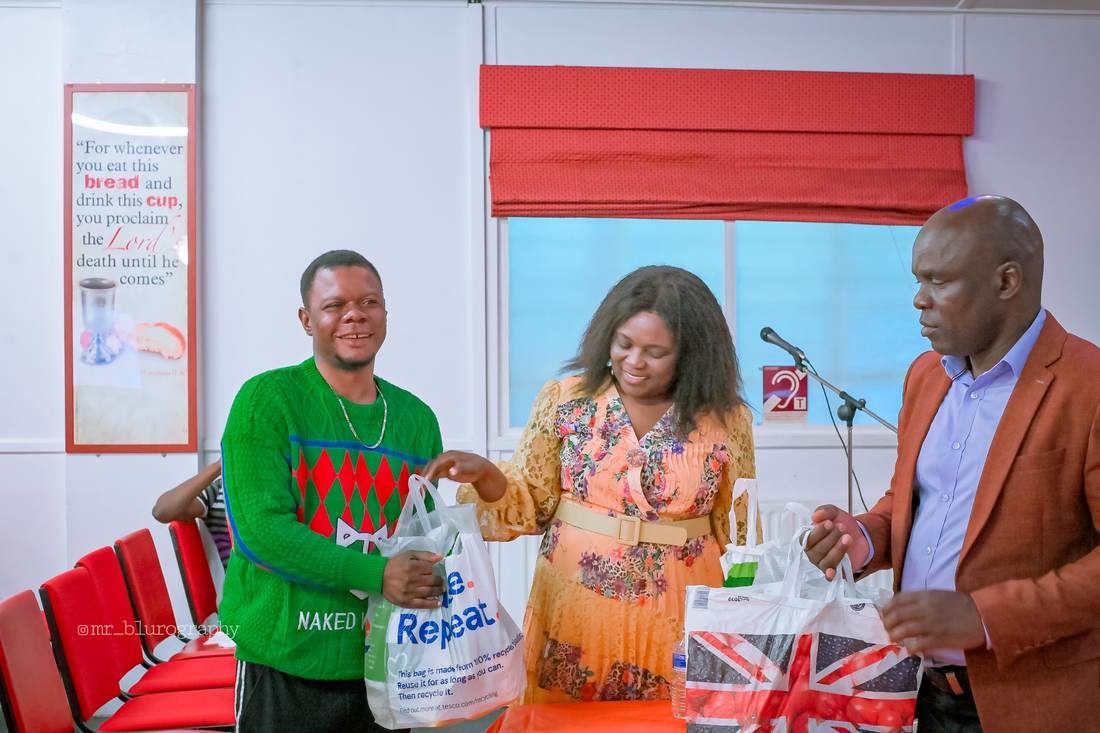 KEMIF volunteers handing out groceries
